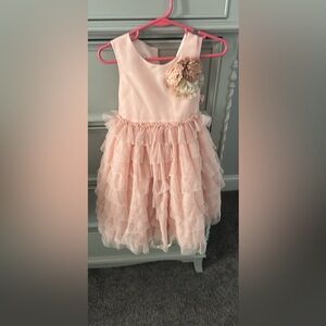 Pink Ruffled Dress with Floral Accent - color is a PEACHy blush. 2T